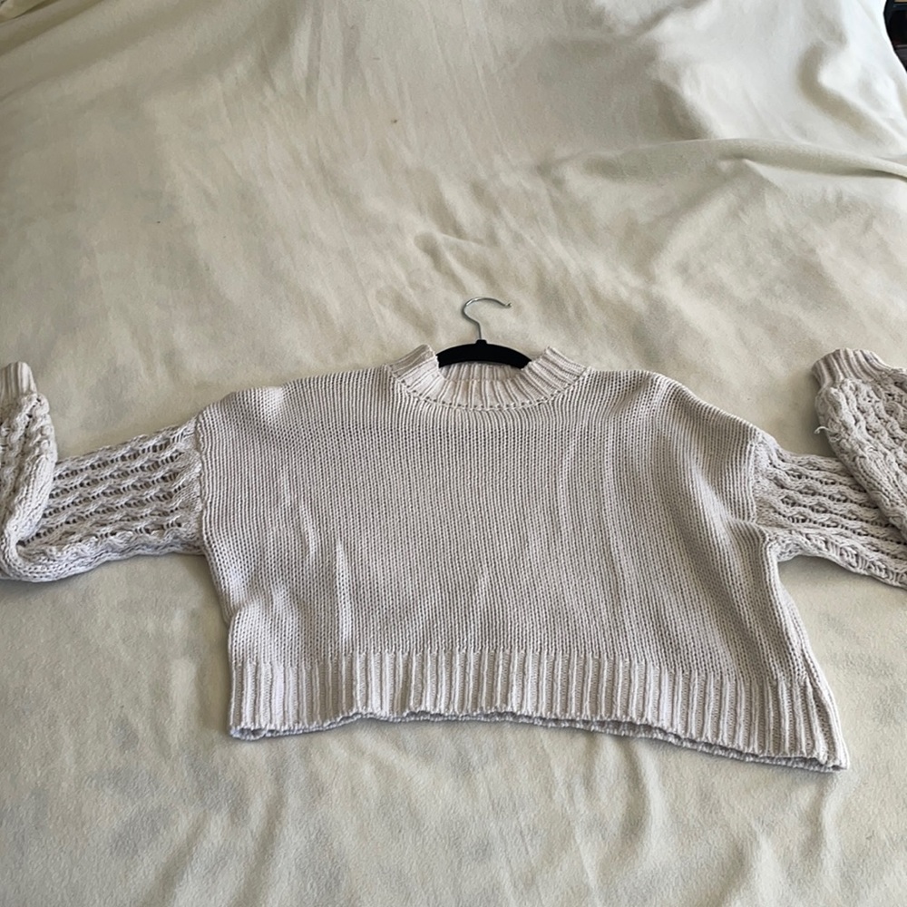 White sweater with puffy sleeves